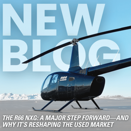 A landed R66 Helicopter with snowy mountains in the distance.